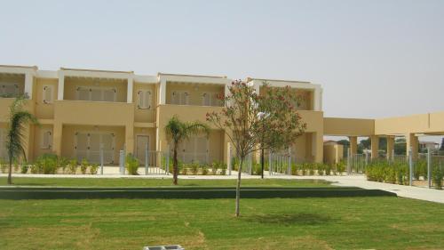 an exterior view of a building at Residence Mar Mediterraneo in Quartu SantʼElena