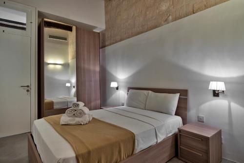 En eller flere senger på et rom på Zoe 2 by Vallettastay