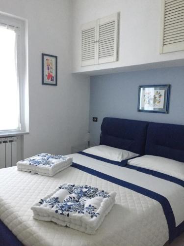 A bed or beds in a room at appartamento Chiara