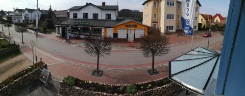 a view of a street in a small town at Koserow Ferienwohnung Fam. Jäger 400m zum Strand in Ostseebad Koserow