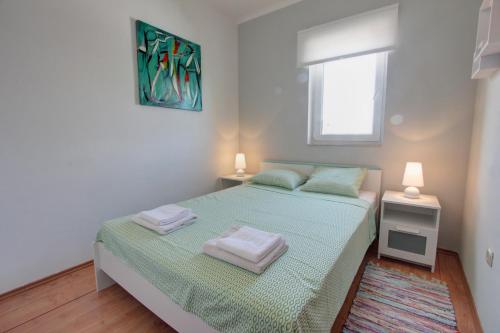 Кровать или кровати в номере Apartman Pula