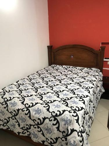 Apartamentos Colonial Homeにあるベッド