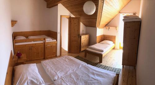 Кровать или кровати в номере Tatralandia apartment
