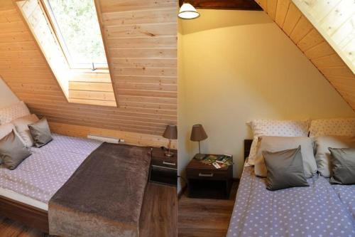 a bedroom with two beds and a window at Zielony Gaj in Krzynka