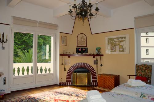 Cama o camas de una habitación en Villa Isabela Bakio Rooms