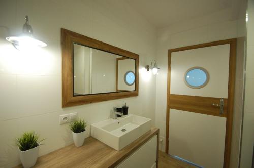 Kúpeľňa v ubytovaní M&K Apartamenty - Słoneczne Tarasy I