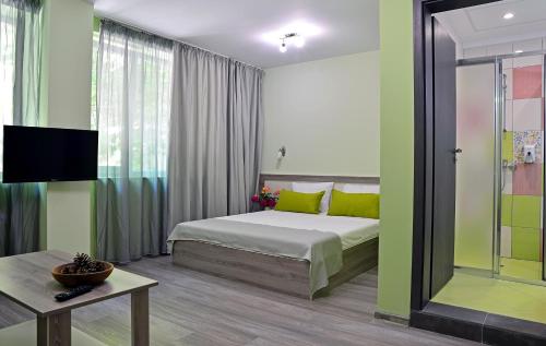 Katil atau katil-katil dalam bilik di Visito Aparthouse