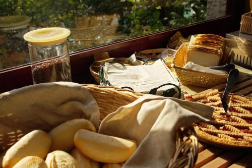 a basket of bread and other food on a table at Tenuta Il Burchio in Incisa in Valdarno