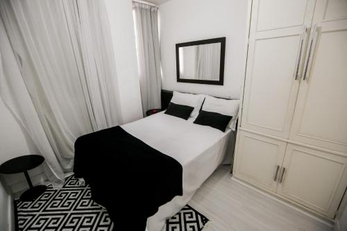 Кровать или кровати в номере Lindo Apto Frente ao Mar