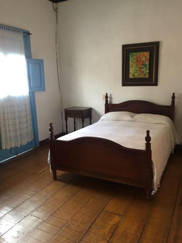 Postel nebo postele na pokoji v ubytování Casa Hotel El Compadre