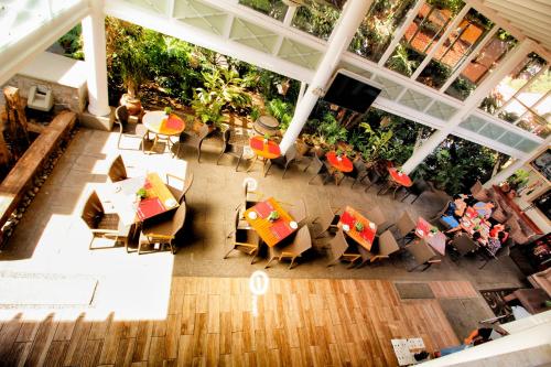 an overhead view of a restaurant with tables and chairs at La Riviera Hotel in San Antonio