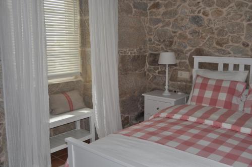 Ένα ή περισσότερα κρεβάτια σε δωμάτιο στο Casa tía Amparo