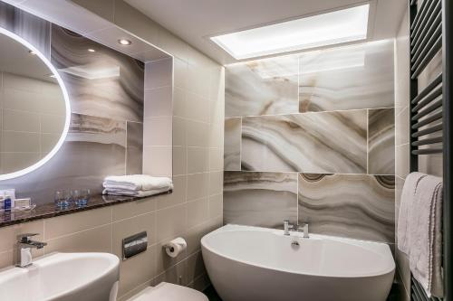 A bathroom at Castle Green Hotel In Kendal, BW Premier Collection 