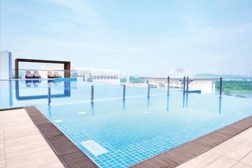 a swimming pool on the roof of a building at Dorsett Putrajaya in Putrajaya