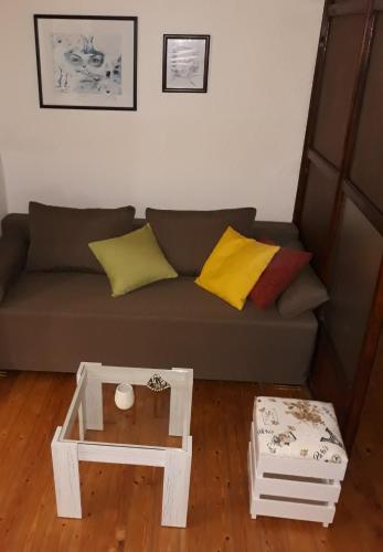 Ein Sitzbereich in der Unterkunft Apartman Centar