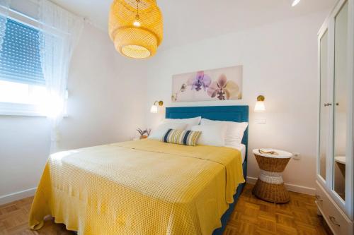 Ένα ή περισσότερα κρεβάτια σε δωμάτιο στο Apartment Skradinska 11