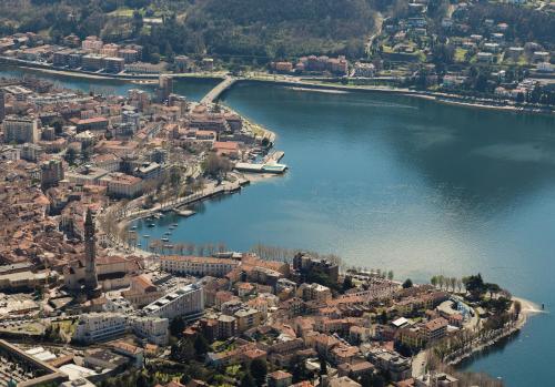 an aerial view of a city next to a river at Hotel Locanda Mel in Calolziocorte