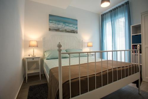 Postel nebo postele na pokoji v ubytování Cozy Coastal apartment GaMa