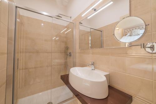 Un baño de Hotel Casa Adele