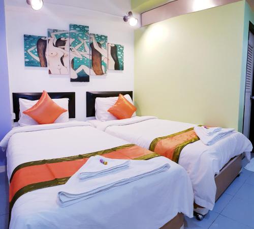 A bed or beds in a room at Casa Picasso Hotel - SHA Plus Certified
