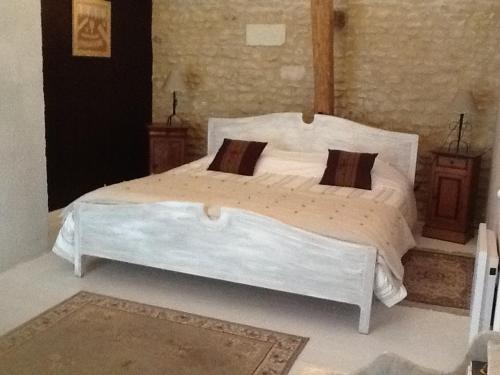 Łóżko lub łóżka w pokoju w obiekcie Château de la Chaise