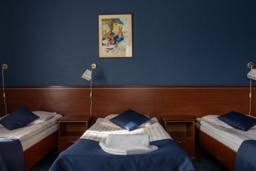 Postel nebo postele na pokoji v ubytování Hotel Skalite Spa & Wellness