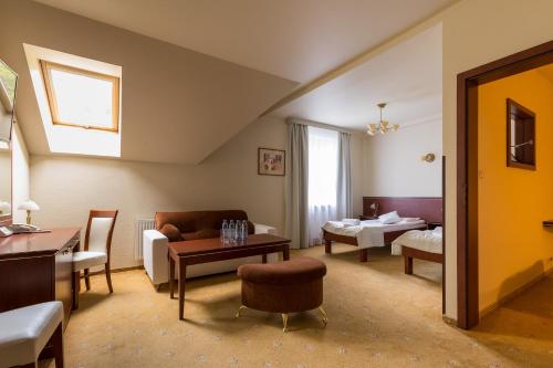 Postel nebo postele na pokoji v ubytování Hotel Skalite Spa & Wellness