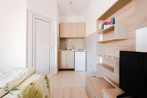 Dapur atau dapur kecil di Apartments Vukmarković