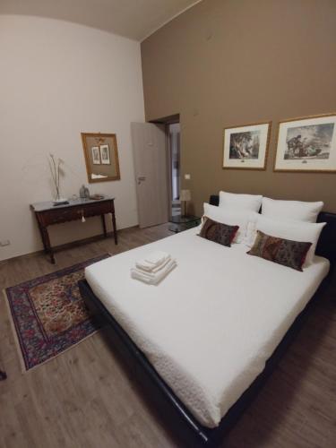 Postel nebo postele na pokoji v ubytování Diadumeno Superior Apartment