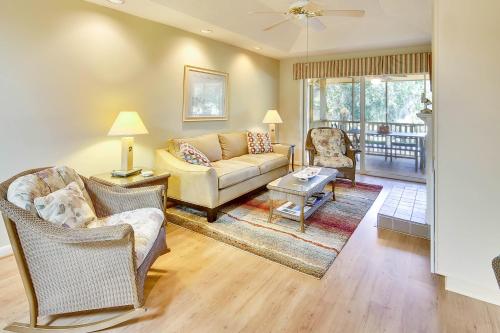 a living room with a couch and chairs at Summerwind Cottage 1140 in Seabrook Island