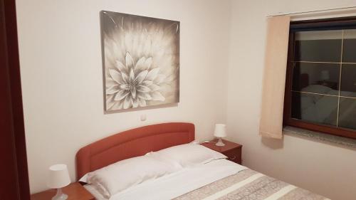 Posteľ alebo postele v izbe v ubytovaní Villa Crikvenica