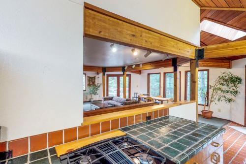 an open kitchen with a view of a living room at Compton's in Girdwood