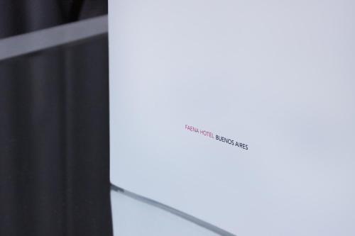 a close up of a window with a sign that reads at Residence Master Suite en Porteño Building in Buenos Aires