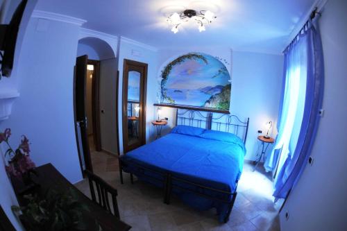 A bed or beds in a room at B&B Miramare
