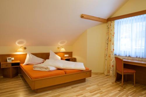 Postelja oz. postelje v sobi nastanitve Alpine Spa Residence