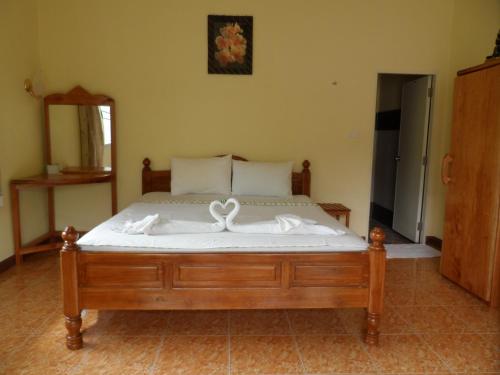 Postel nebo postele na pokoji v ubytování Khaolak Summer House Resort