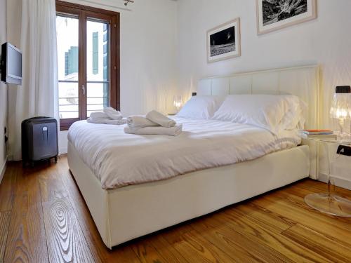 Säng eller sängar i ett rum på Residence Le Bugne
