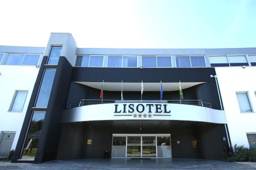 a building with the sign of the lestetter inn at Lisotel - Hotel & Spa in Leiria