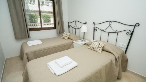 Posteľ alebo postele v izbe v ubytovaní Marina de la Duquesa 312