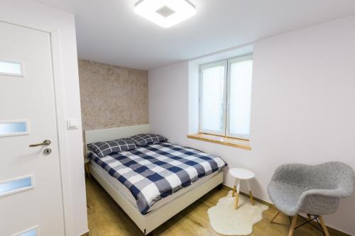 Ένα ή περισσότερα κρεβάτια σε δωμάτιο στο Apartament Pola