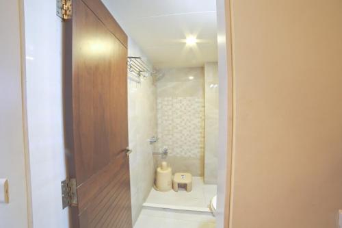 Ванная комната в Hotel Grand Pragati