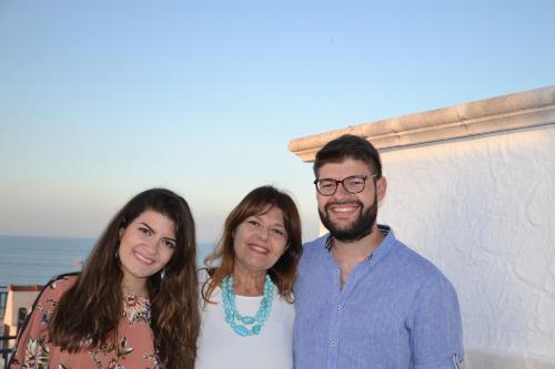 a man and two women standing next to each other at Cuore di Vieste in Vieste