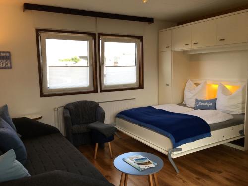 Ein Bett oder Betten in einem Zimmer der Unterkunft FeWo Piper