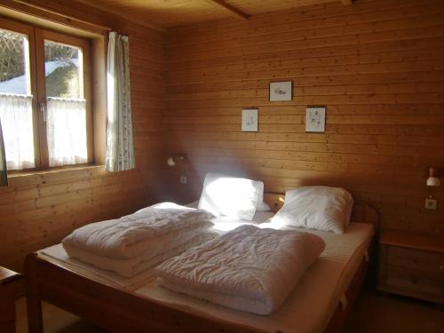 Posteľ alebo postele v izbe v ubytovaní Blockhaus Kathrein