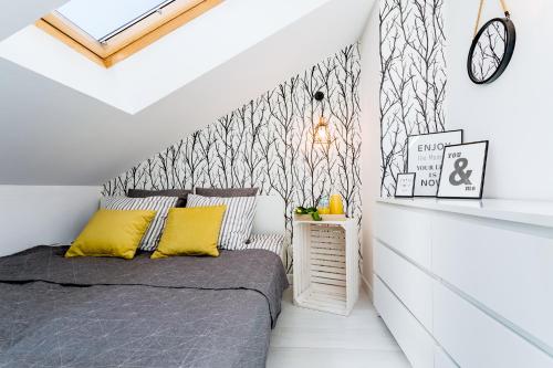 Posteľ alebo postele v izbe v ubytovaní Apartament 43 z widokiem na jezioro - Giżycko