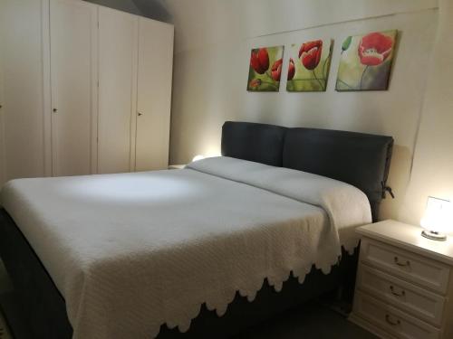 A bed or beds in a room at BeB I Girasoli