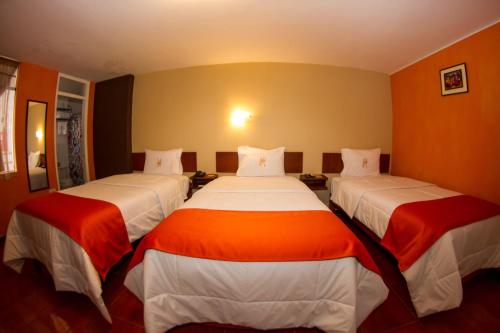 Postel nebo postele na pokoji v ubytování Hotel Sol de Belén Cajamarca