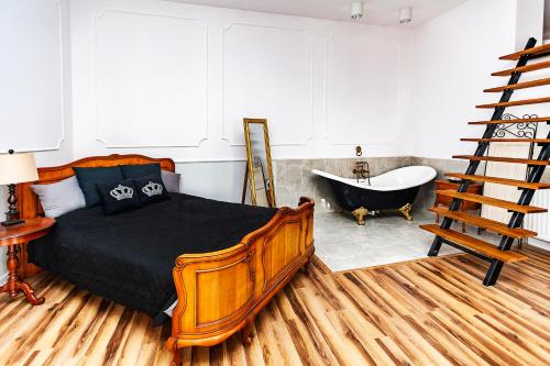Voodi või voodid majutusasutuse Royal Apartment toas