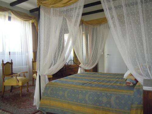 Postel nebo postele na pokoji v ubytování agriturismo Piccolo Albero
