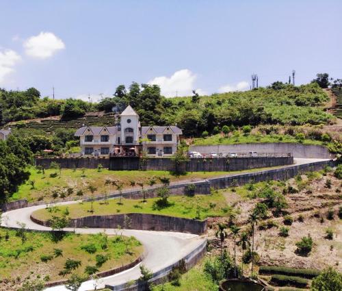 an aerial view of a house on a hill at Black Chimney in Datong